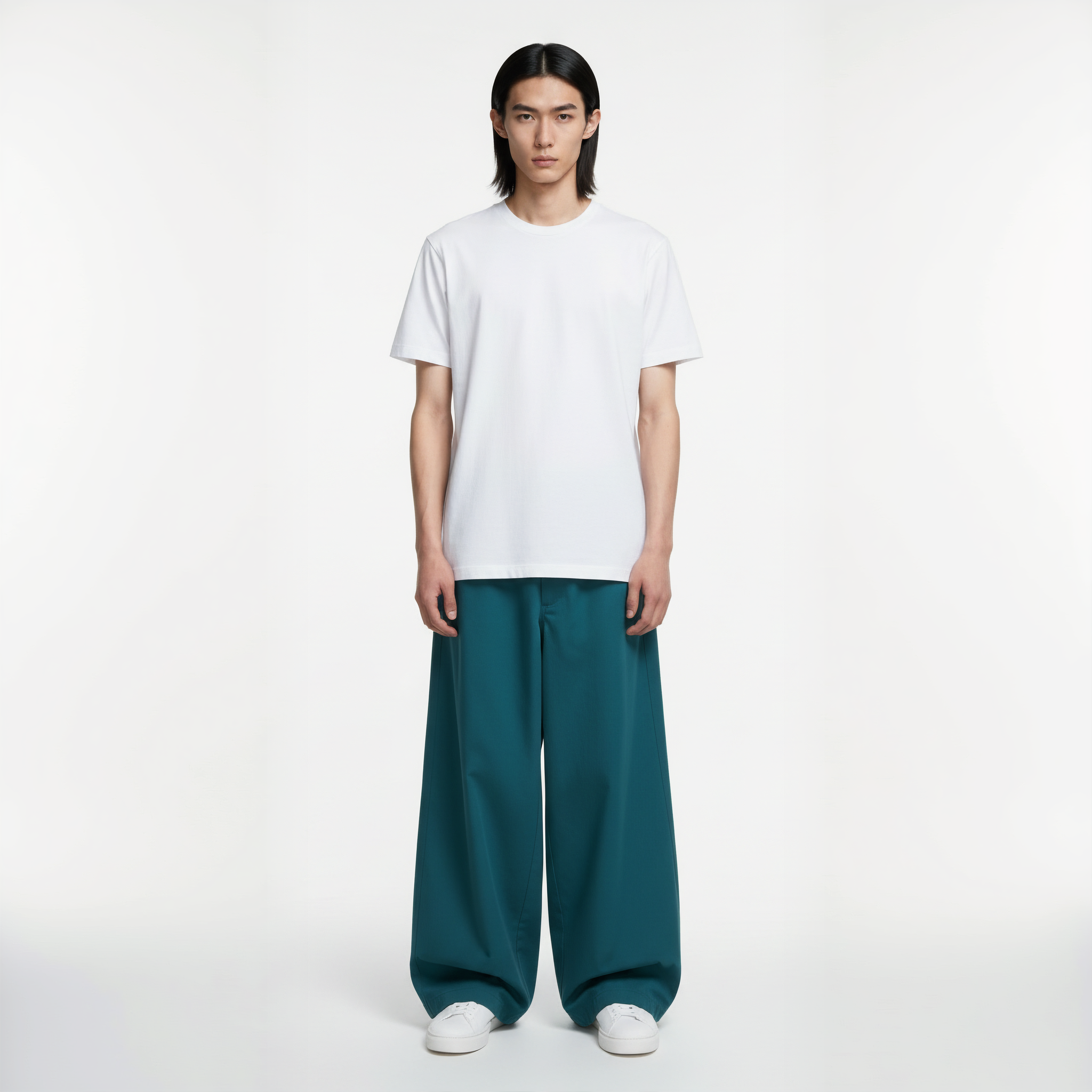 Men’s teal baggy sweatpants with oversized fit and relaxed silhouette